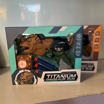Pistol Dinozaur cu Săgeți și Țintă - Cutie Cadou (Set de 2)